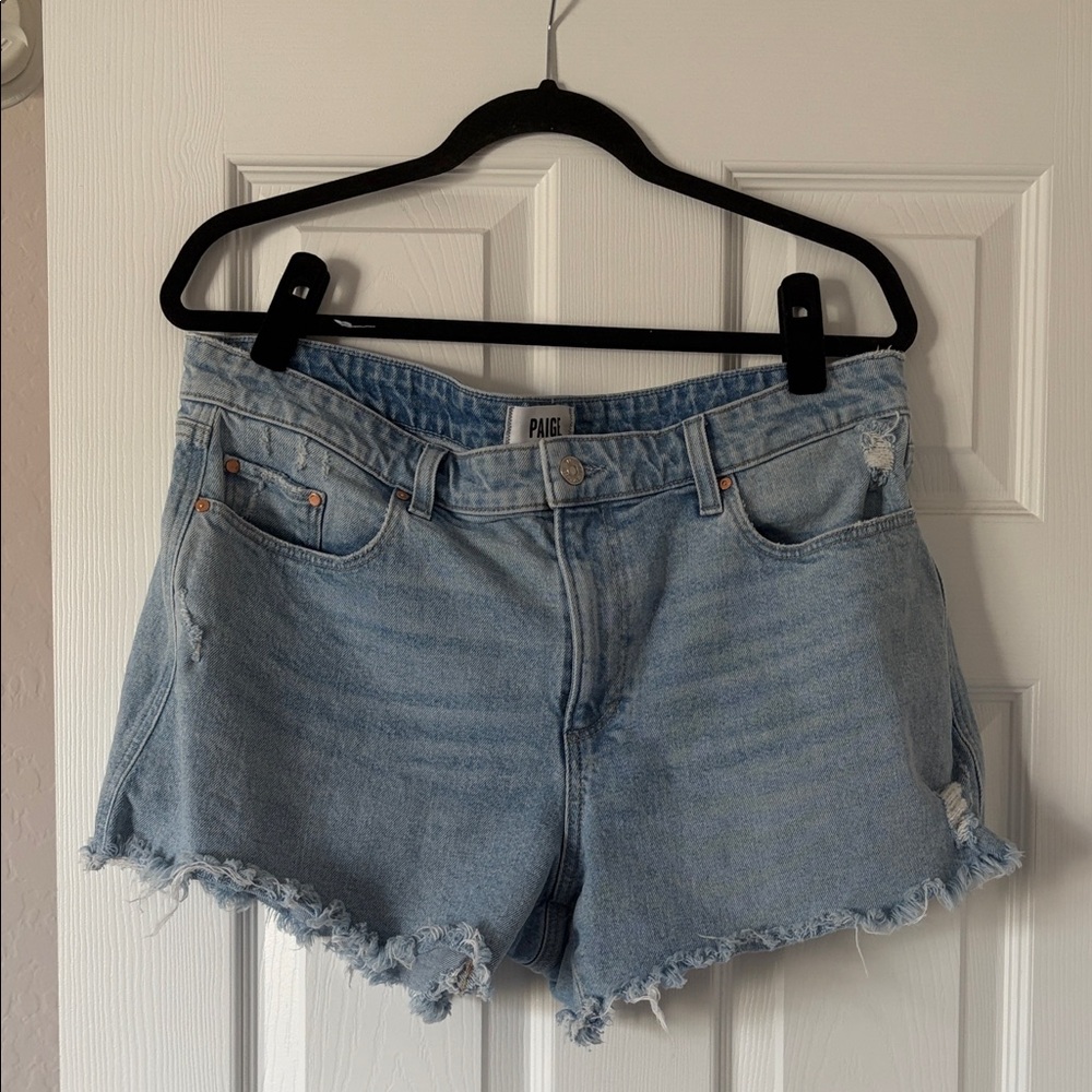 PAIGE Dylan Light Wash Distressed Denim Cutoff Shorts